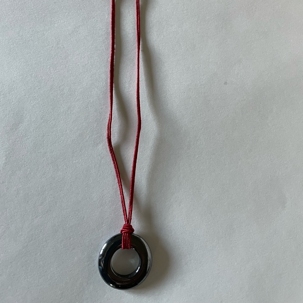 Gun powder color donut pendant with red string necklace